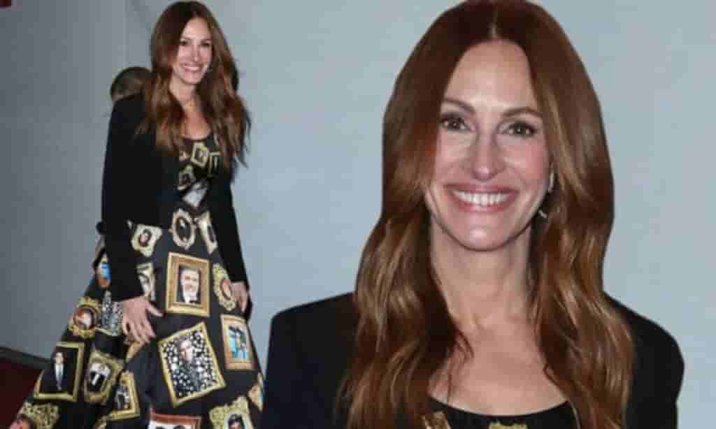 A dress covered in pictures of George Clooney is worn by Julia Roberts in support of her friend in Washington D.C.
